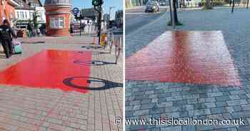 Forest Gate station Pride flags vandalised with red paint