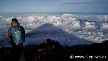 Rescuers seek to bring down bodies found on Japan's Mount Fuji