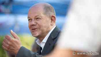 Erheiterung bei Ortsbesuch: Scholz trägt nach Rasier-Malheur ein Pflaster