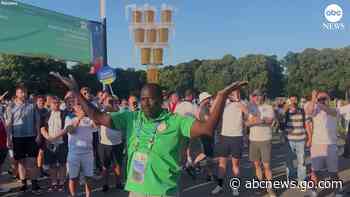 WATCH:  Euro 2024 volunteer balances 9 beers on his head