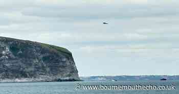 RNLI and Coastguard rush to sinking boat in Studland