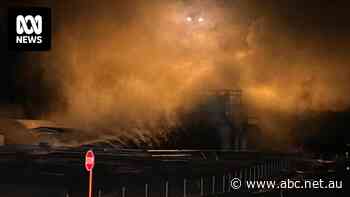 Residents warned to stay indoors amid battle to stop underground mine inferno, as black smoke fills sky
