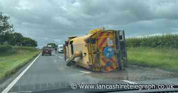 Barrowford Road: Truck on its side and leaking fluid