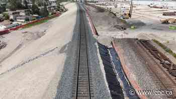 How do you construct an underpass below a busy rail line? Build a bridge