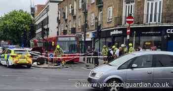 Mitcham London Road crash: Woman taken to hospital