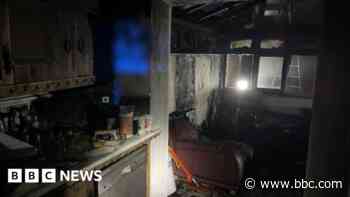 Neighbour saves couple and dog from burning home