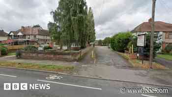 Woman charged after dog bites three people