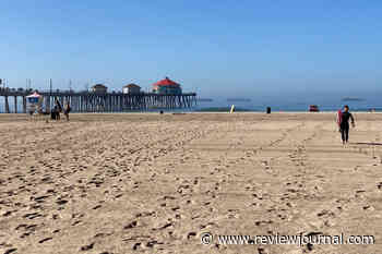 Attack kills 2 and injures 3 others in Huntington Beach, police say