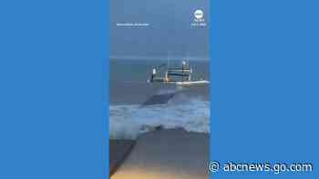 WATCH:  Storm surge from Hurricane Beryl consumes pier in Grand Cayman