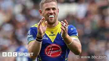 Warrington thrash Huddersfield to keep pace at top