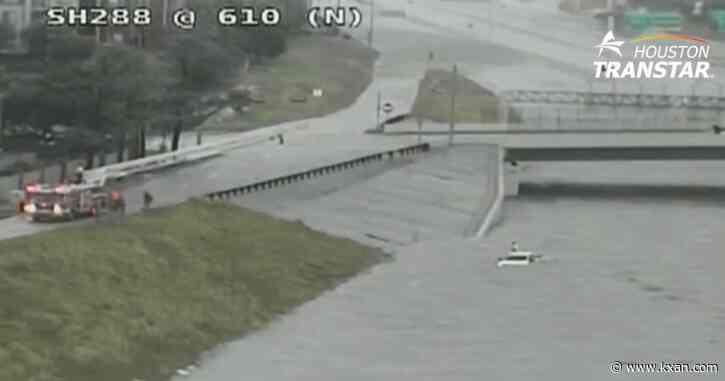 VIDEO: Houston man rescued from his truck in severe flood waters during Hurricane Beryl