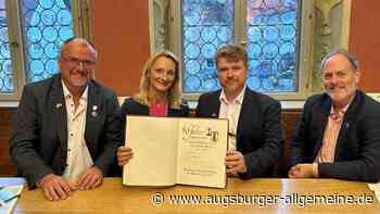 Städtepartner aus Hudson tragen sich ins Goldene Buch ein