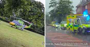 Bushey road in shock amid triple murder manhunt