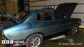 Man charged after 72 gun parts found inside car