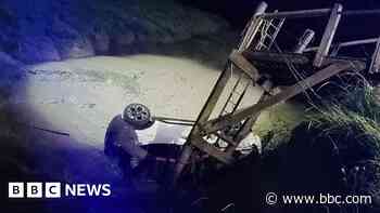 Driver rescued after car crashes into creek