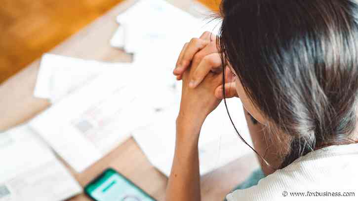 One in three working Americans living paycheck to paycheck, survey shows