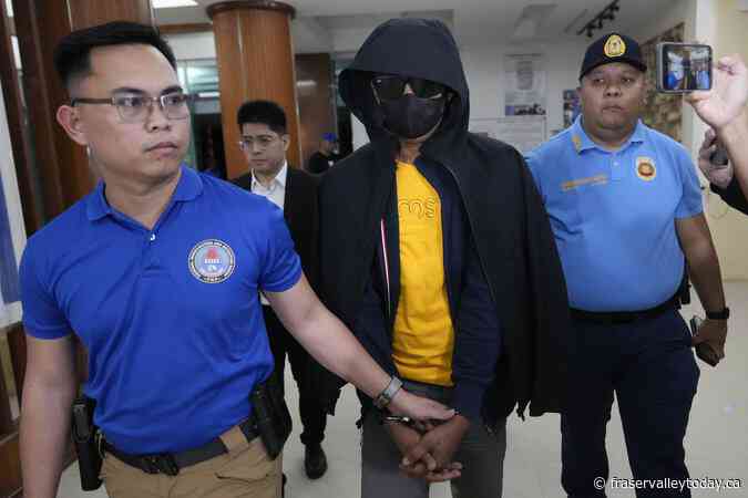 Philippine officials say suspect in the killings of 2 Australians and a Filipina has surrendered