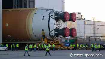 NASA rolls giant Artemis 2 moon rocket core off the factory floor for astronaut mission (video)