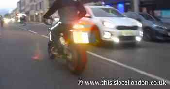 Dalston shooting: Images of wanted motorcyclist released