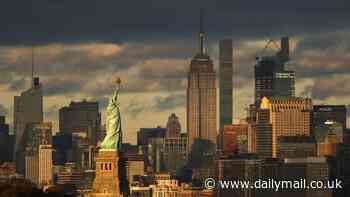Giant fireball meteor whizzes over Statue of Liberty as residents report feeling a shaking and hearing a 'boom'