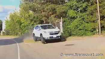 Mass. woman charged with punching firefighter at crash scene