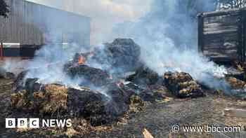 Crews tackle 15 tonnes of straw on fire in village