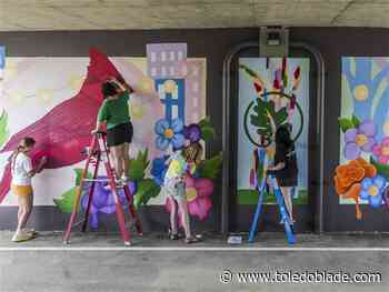 Photo Gallery: Students add final details to mural on Harroun Park Trail