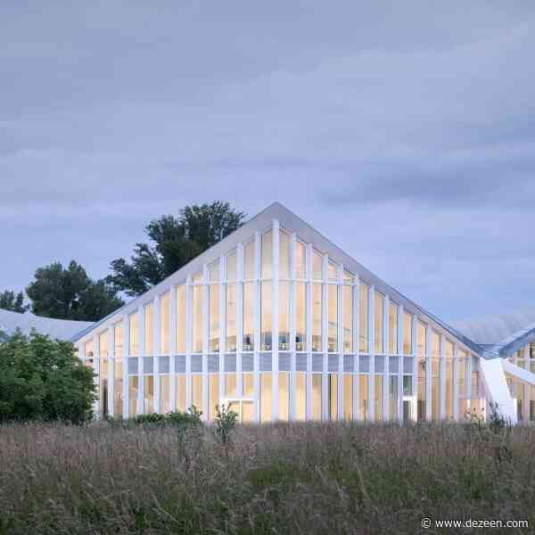 GMP Architekten renovate hyperbolic 1960s hall in Magdeburg