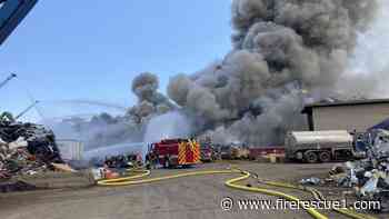 Ore. firefighters battle 4-alarm metal pile fire