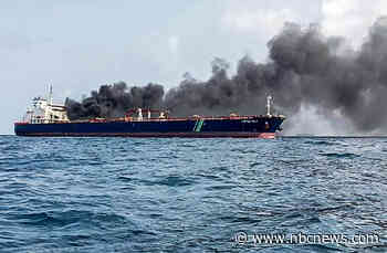 Oil tankers on fire after colliding close to Singapore, crew rescued
