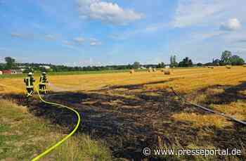 FW Königswinter: Ballenpresse und Feld fangen Feuer