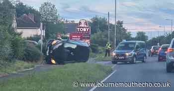 Car flips after crashing outside Christchurch Toby Carvery