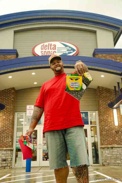Dion Dawkins collaborating with Delta Sonic to donate school supplies