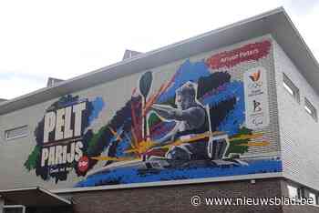 Muurschildering van olympiër Artuur Peters op oude ‘boekerij’ in Pelt