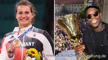 Paris 2024: Schröder und Wagner tragen die deutsche Fahne