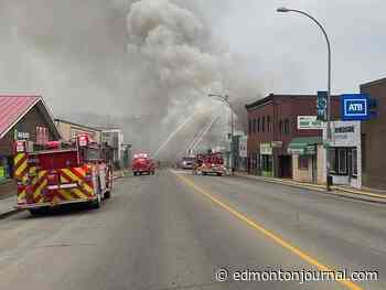 Mounties warn drivers to avoid downtown Athabasca as crews battle building fire