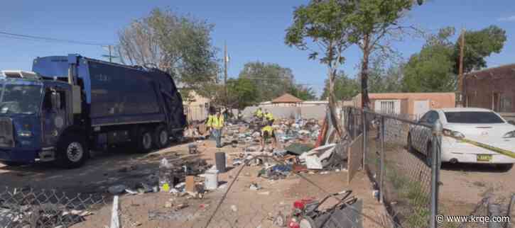 How does the City of Albuquerque handle possessions from homeless encampments?