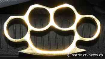 Female allegedly assaulted in moving vehicle by suspect with brass knuckles