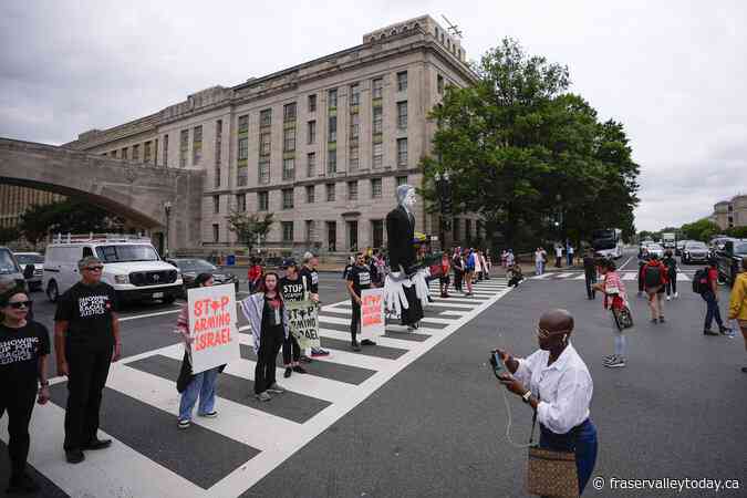 Police deploy pepper spray as crowd protesting Israel’s war in Gaza marches to the U.S. Capitol