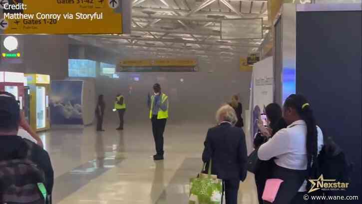 Video: Smoke fills terminal at New York's JFK Airport, injuring 9