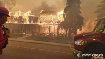 Firefighters battle to save Jasper's buildings, infrastructure as wildfire engulfs town