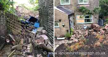 Woman scared after car crashes into Oswaldtwistle home