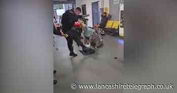 Manchester Airport: Police officer suspended after video emerges