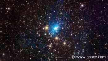 X-rays reveal secret gas in huge and distant galaxy cluster