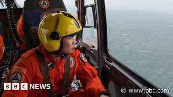 Race to contain 'enormous' oil spill after ship sinks off Philippines