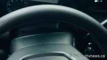 Truck spotted swerving all over road and hitting signs