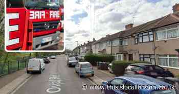 Oval Road North, Dagenham fire: Man, 70s, died, man arrested