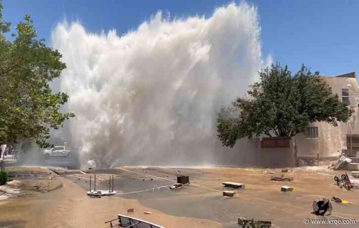 Water main break explodes out of road in NE Albuquerque