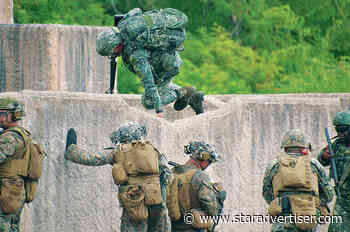 Military forces practice coastal combat at Bellows during RIMPAC