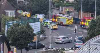 Colliers Wood Merantun Way crash: Pictures of scene